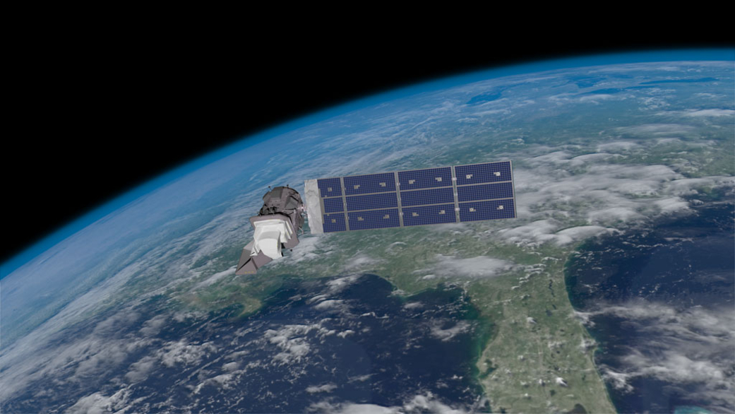 Illustration of the Landsat 9 spacecraft in orbit around Earth, passing over the US from the Great Lakes to the Gulf of Mexico.