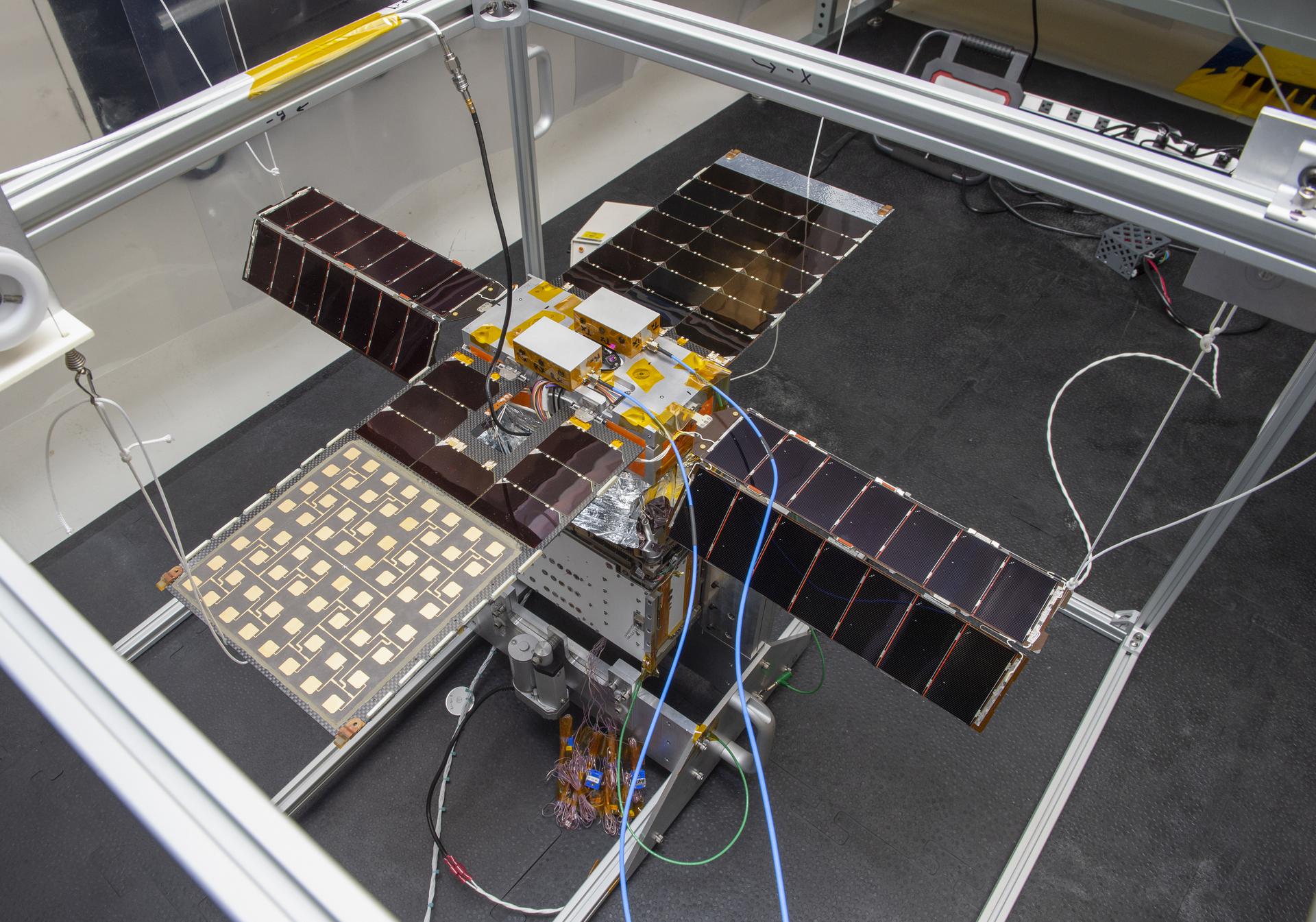 NEA Scout spacecraft in Gravity Off-load Fixture, System Test configuration at NASA Marshall.