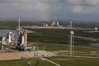 Space shuttle Atlantis (foreground) on Launch Pad A and Endeavour on Launch Pad B