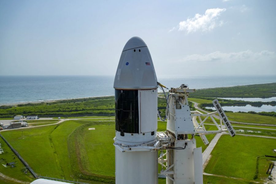 CRS-23: SpaceX Dragon spacecraft atop the company's Falcon 9 rocket