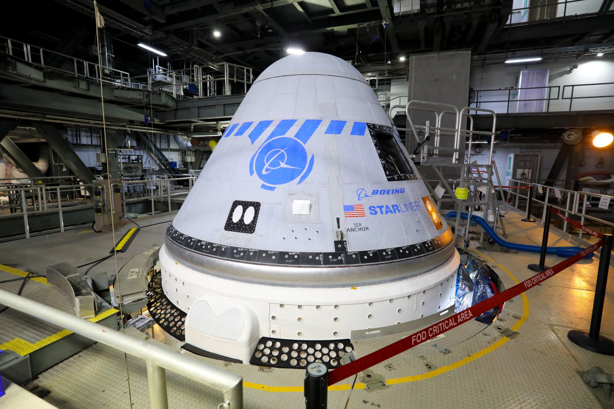 Starliner spacecraft inside Boeing faclity