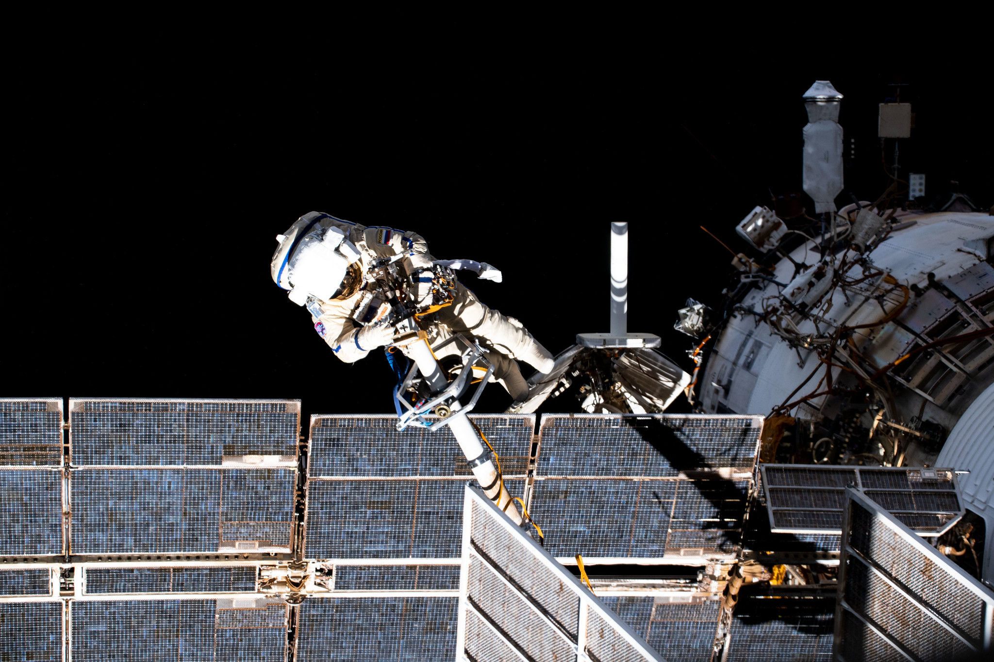 Expedition 65 flight engineer and Roscosmos cosmonaut Pyotr Dubrov, pictured during a spacewalk to perform work on the Pirs docking compartment.