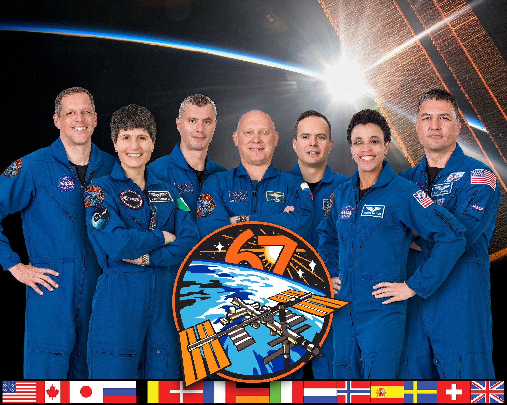 The official portrait of the seven-member Expedition 67 crew