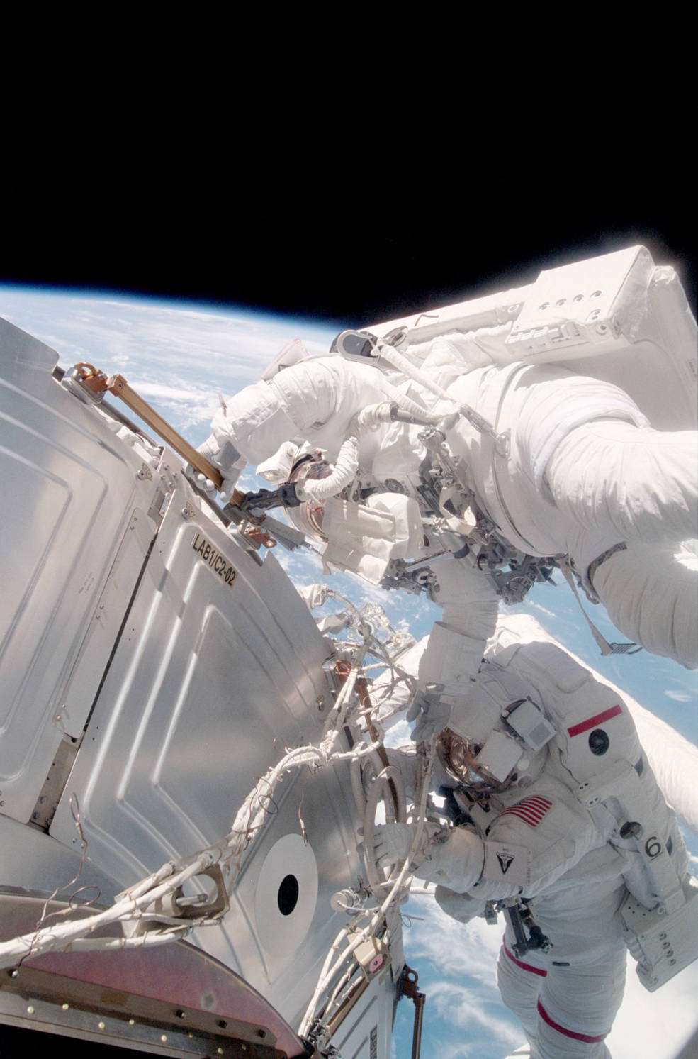iss20_sts_105_18_eva2_forrester_and_barry_work_on_s0_lta_cables