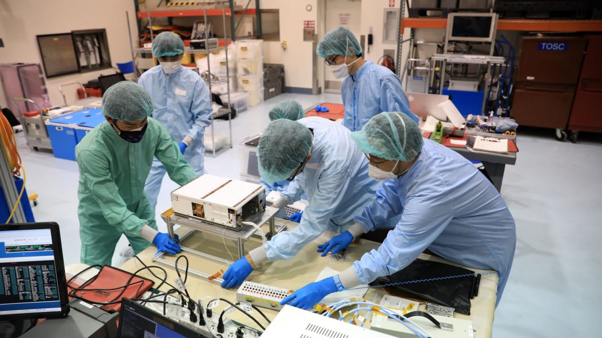 The OMOTENASHI team prepares their secondary payload for a ride on the SLS rocket during the Artemis I mission.