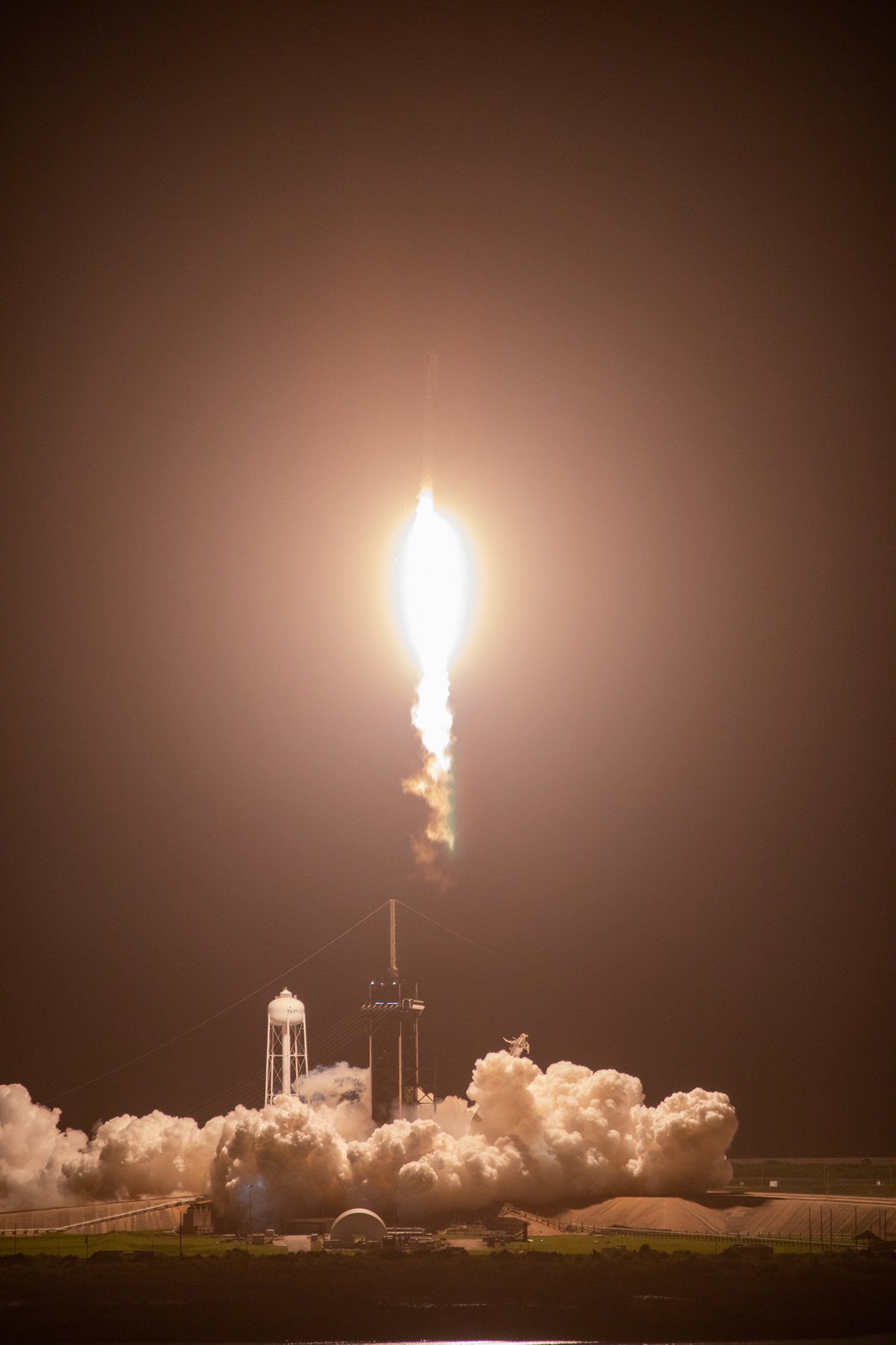 A SpaceX Falcon 9 rocket, topped with the uncrewed Dragon spacecraft, soars upward after lifting off from NASA Kennedy Space Center’s Launch Complex 39A in Florida at 3:14 a.m. Sunday, Aug. 29, 2021.