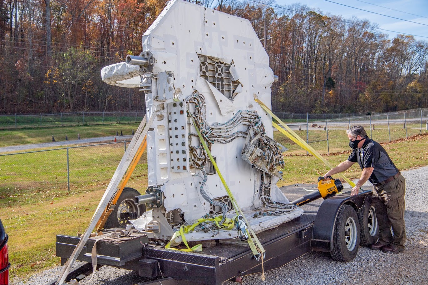 Teledyne Brown Engineering guides the Astro cruciform toward the refurbishment project site at the U.S. Space & Rocket Center.