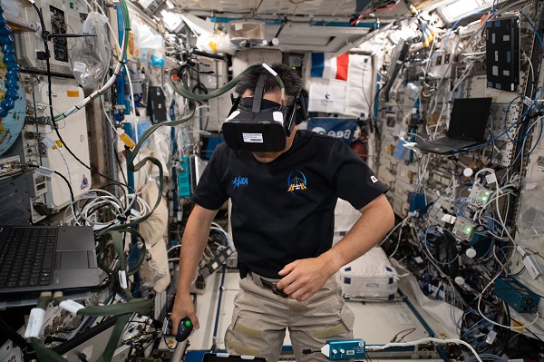 image of astronaut working with VR experiment