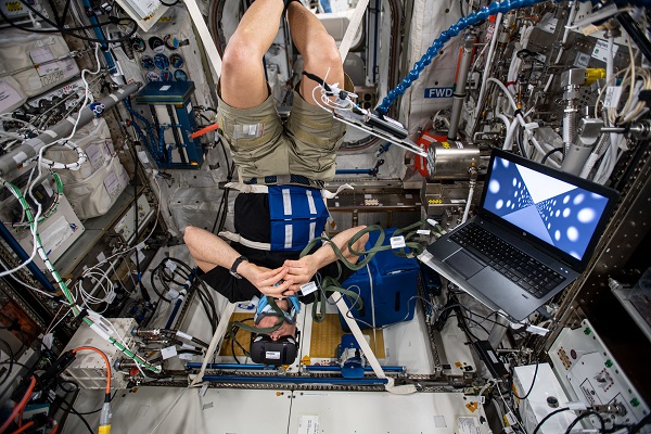 image of astronaut wearing VR goggles
