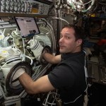 Astronaut Thomas Pesquet of the European Space Agency works on the ring-sheared drop experiment.