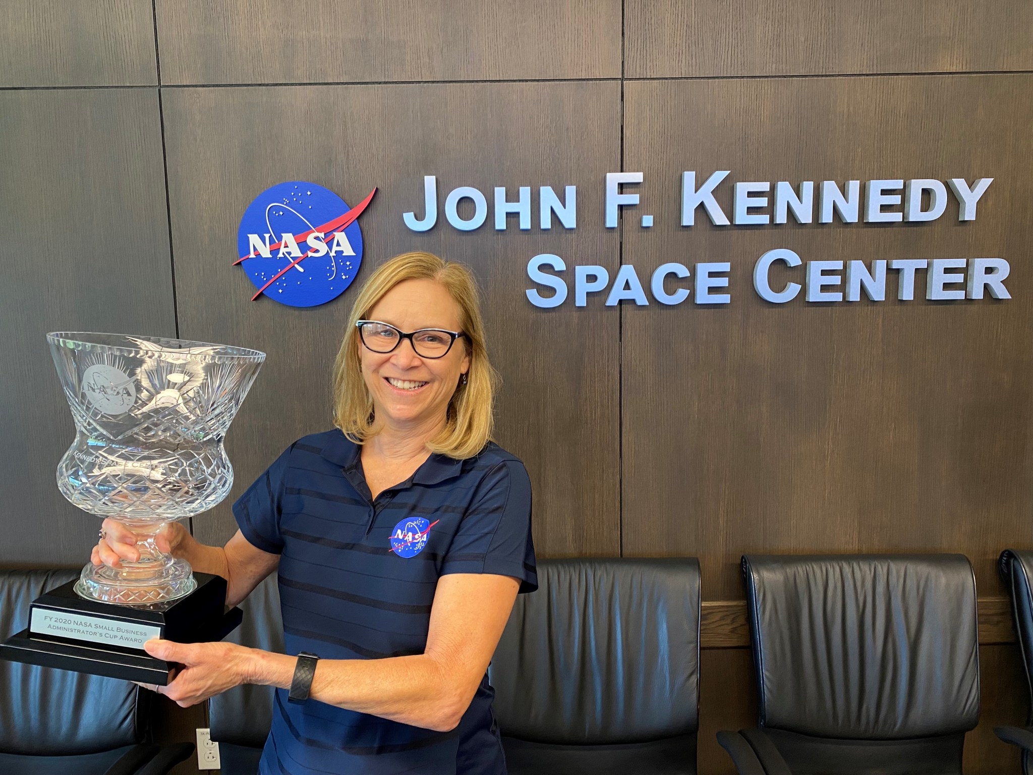 Janet Petro holds the Administrator's Cup Award, awarded to Kennedy Space Center's Office of Small Business Programs for fiscal year 2020.