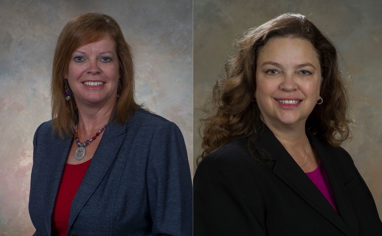 Marshall’s Julie Bassler, left, and Ginger Flores tied for the Outstanding Senior Leader Award Aug. 19.