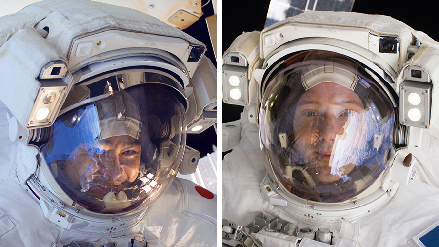 Astronauts (from left) Akihiko Hoshide and Thomas Pesquet are pictured outside of the space station with their U.S. spacesuit helmet visors up during earlier spacewalks.