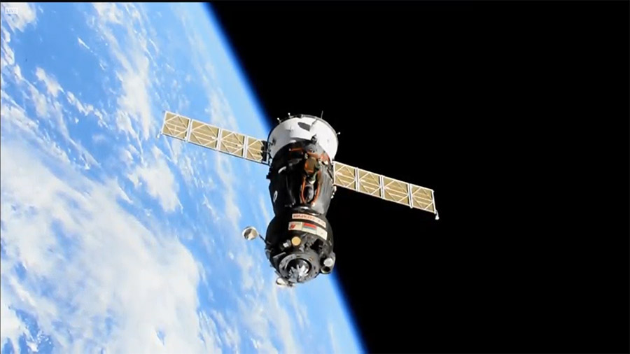 The Soyuz MS-18 spacecraft with three Expedition 65 crewmates inside backs away from the station to relocate to a new docking port.