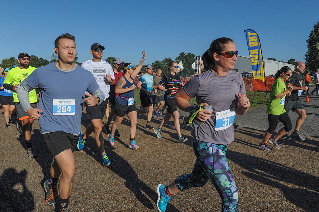 Participants in the Racin’ the Station duathlon compete during one of the race’s two running segments Sept. 25.