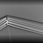 Schlieren image of a T-38 aircraft creating shock waves during supersonic flight.