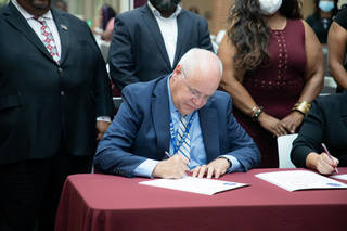 NASA's Goddard Space Flight Center Dennis Andrucyk signs the Space Act Agreement with University of Maryland Eastern Shore.