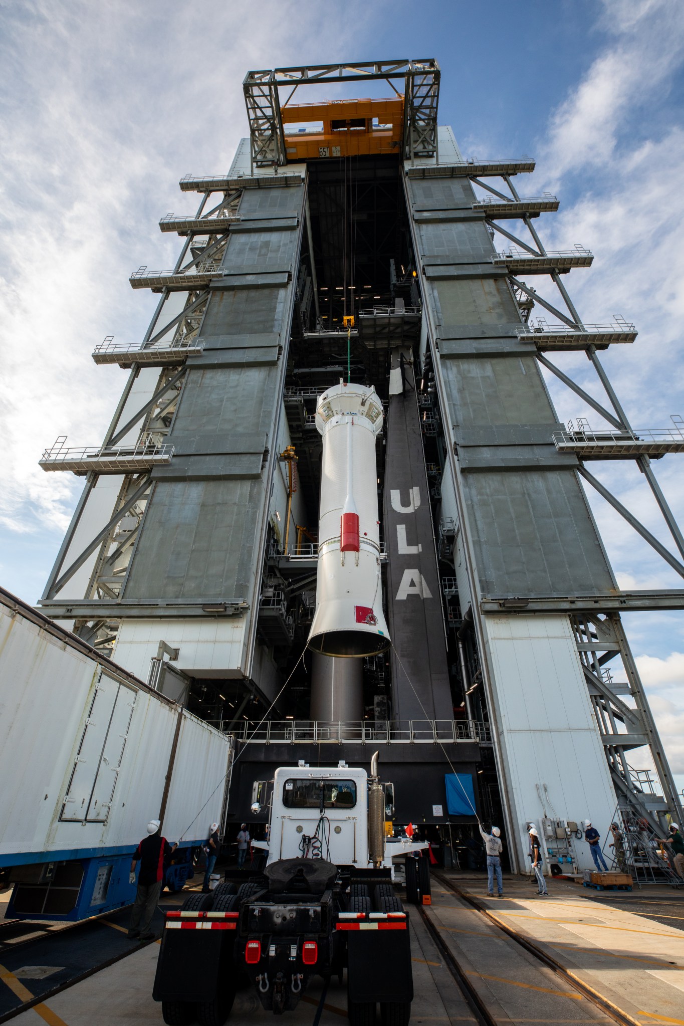 The United Launch Alliance (ULA) Centaur stage for NASA’s Lucy mission is lifted by crane into the Vertical Integration Facility near Space Launch Complex 41 at Cape Canaveral Space Force Station