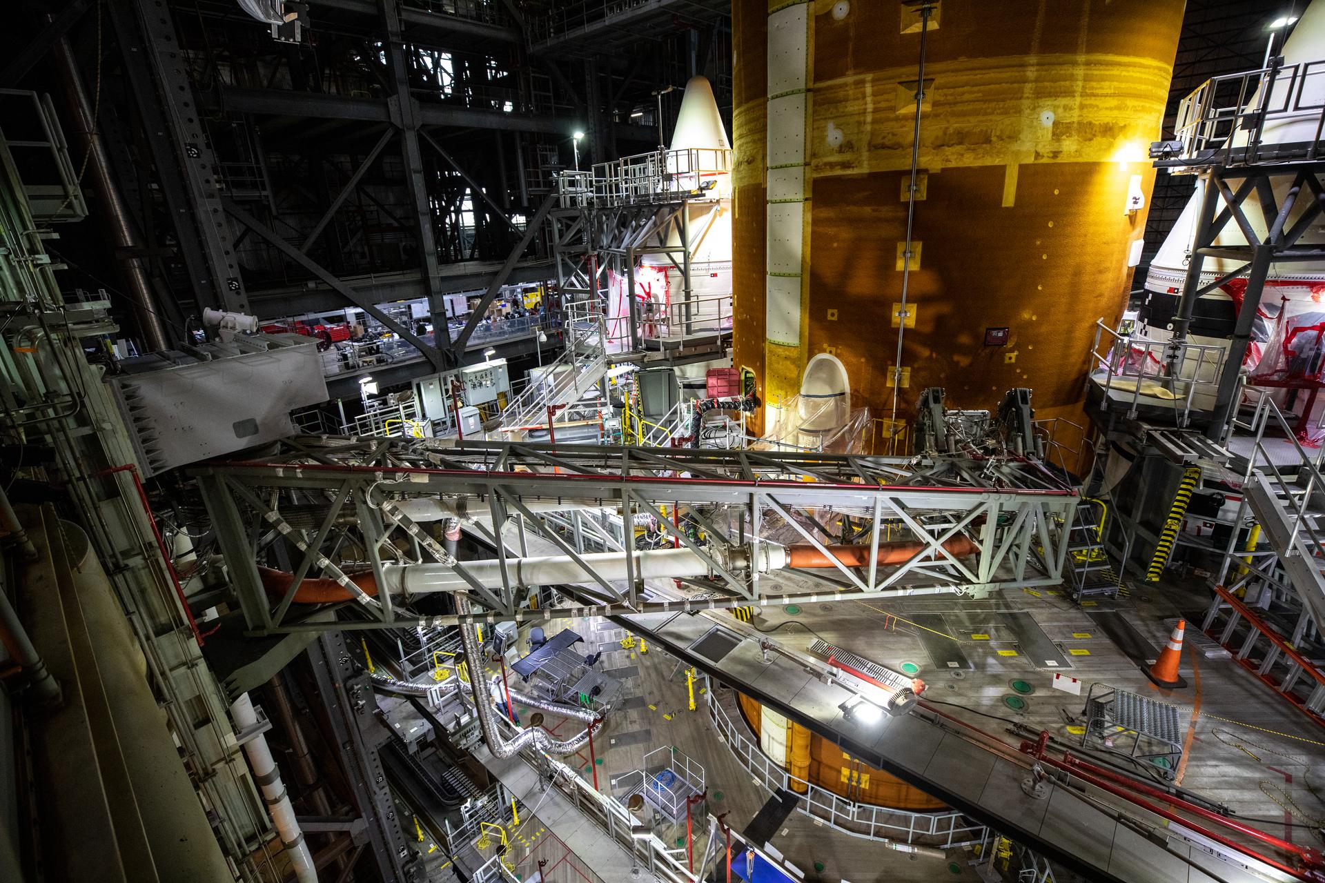 The core stage inter-tank umbilical is attached to the Space Launch System (SLS) core stage inside the Vehicle Assembly Building at NASA’s Kennedy Space Center in Florida on Aug. 12, 2021.