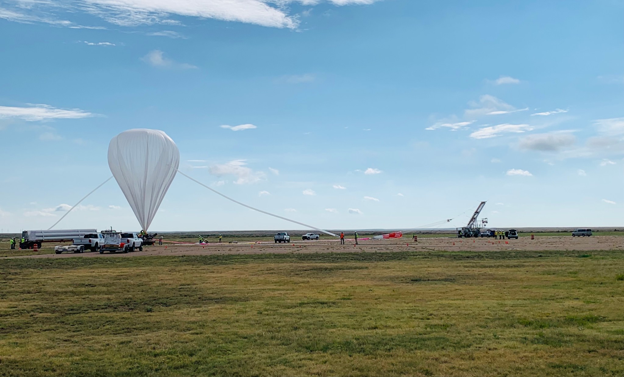 scientific balloon being inflated before release.