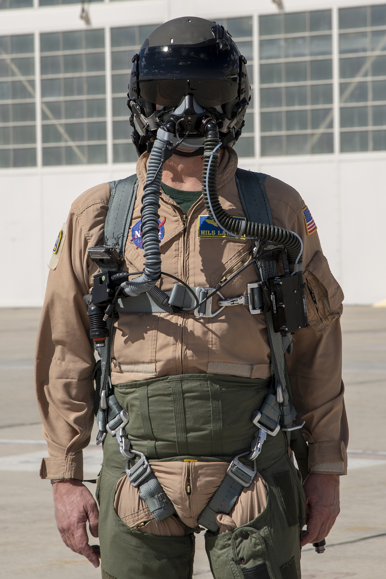 NASA Pilot Nils Larson wears a U.S. Air Force configuration g-suit.
