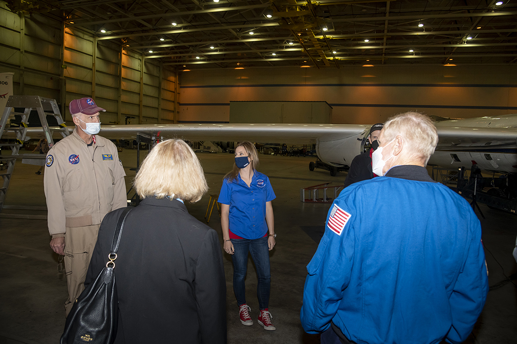 NASA Administrator Bill Nelson and NASA Deputy Administrator Pam Melroy receive a briefing on the high-altitude ER-2 aircraft.