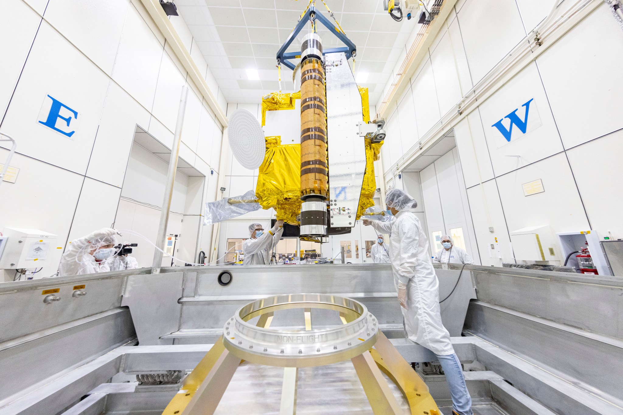 DART spacecraft being moved into a specialized shipping container 