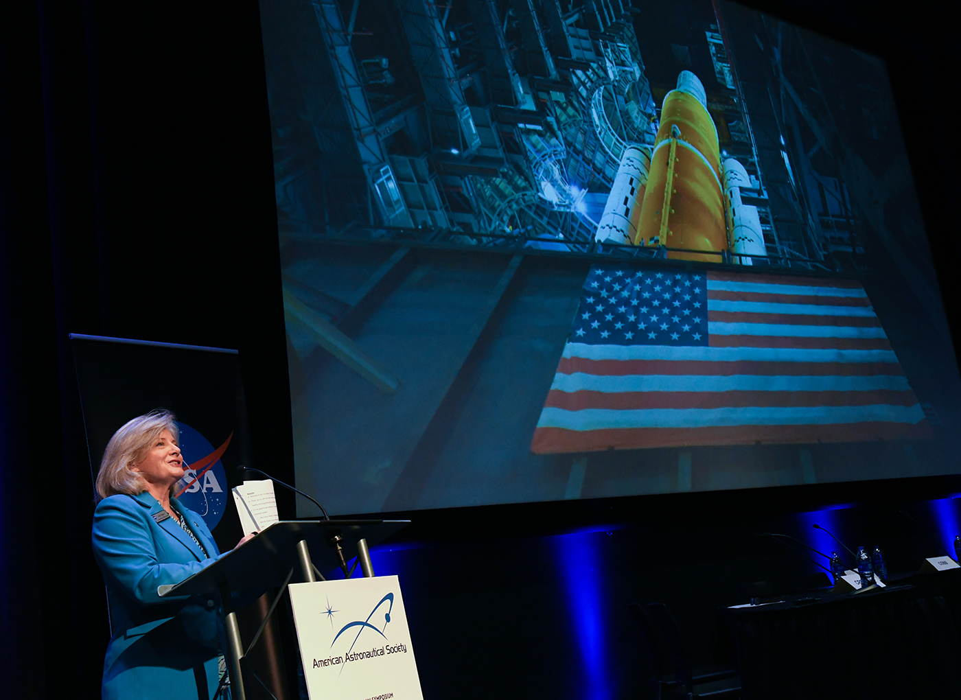 Marshall Director Jody Singer delivers opening remarks at the Wernher von Braun Memorial Symposium Oct. 12.