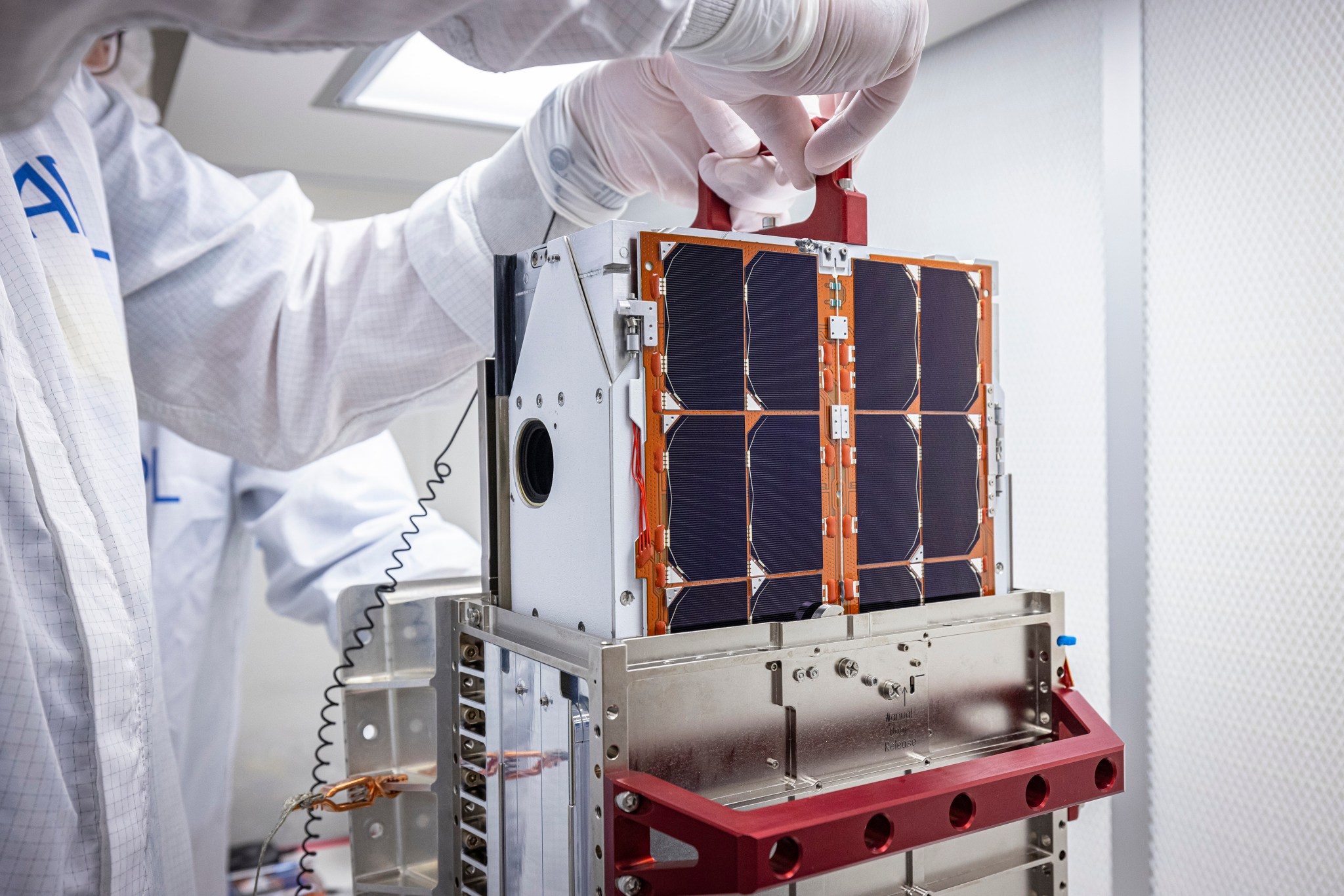 DART team engineers lift and inspect the LICIACube CubeSat