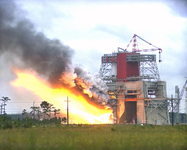 A plume of flame is emitted as NASA conducts the first test of the Saturn V S-IC-5 rocket stage on the B-2 Test Stand at Stennis Space Center on Aug. 25, 1967.
