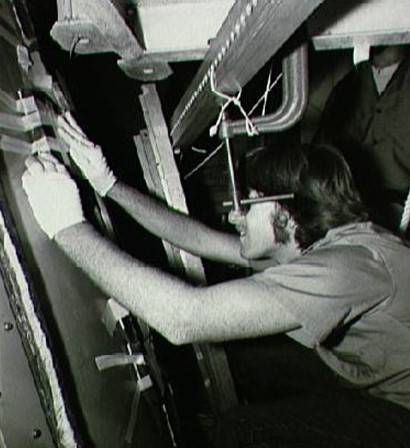 technician_mounting_tile_after_oxidizer_spill_oct_1981