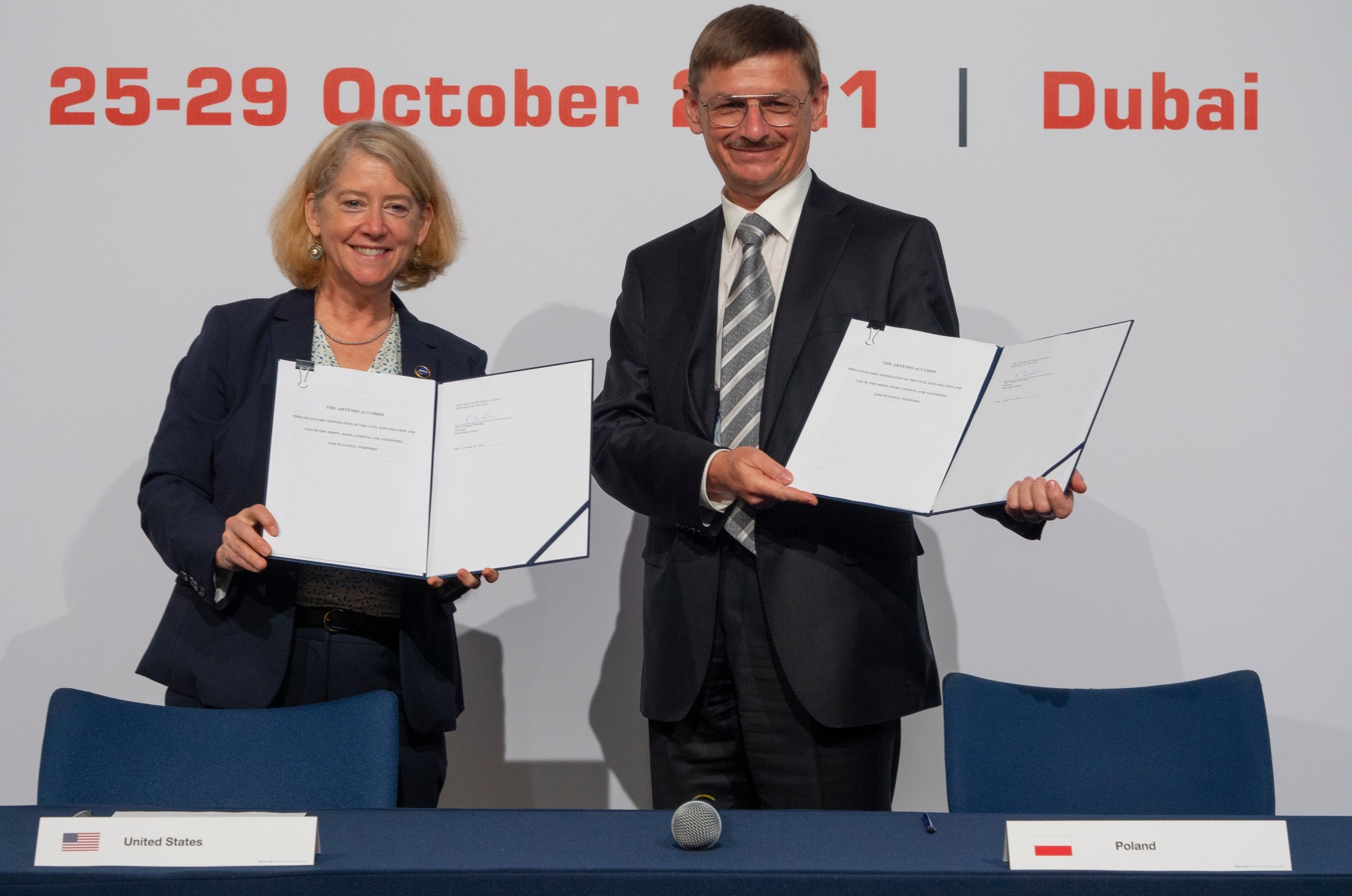 NASA Deputy Administrator Pam Melroy and Polish Space Agency (POLSA) President Grzegorz Wrochna pose following an Artemis Accords signing ceremony in Dubai, United Arab Emirates, Oct. 26, 2021. 