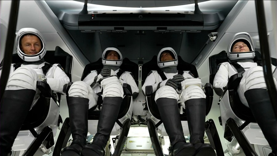 NASA's SpaceX Crew-3 astronauts are seen inside the Crew Dragon spacecraft just before their seats were rotated into a launch position on Nov. 10, 2021.