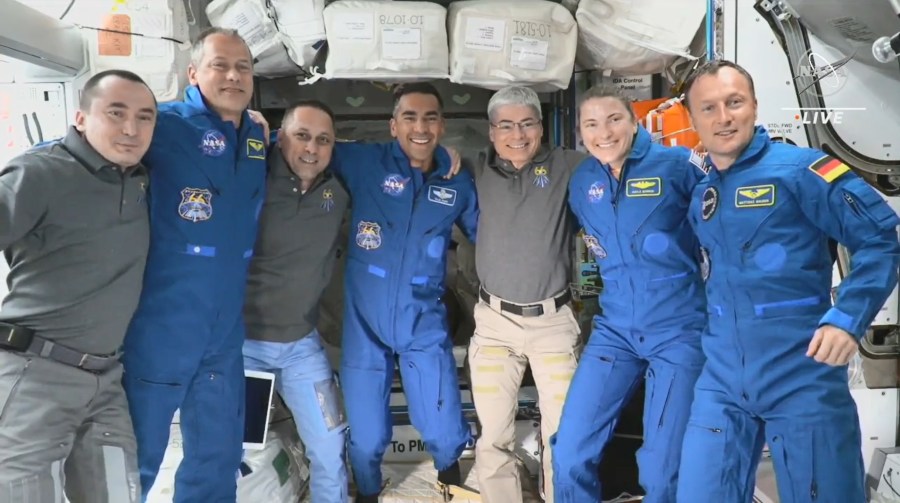 The Expedition 66 crew poses for a photo after SpaceX Crew-3's arrival to station.