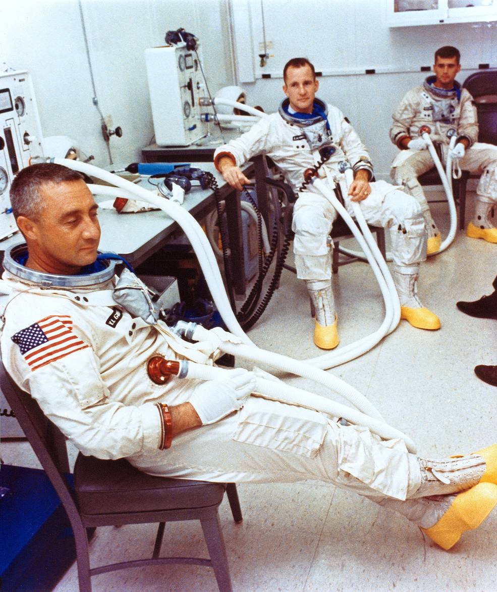 grissom_white_and_chaffee_seen_suited_for_a_chamber_test_at_ksc-10.18.66