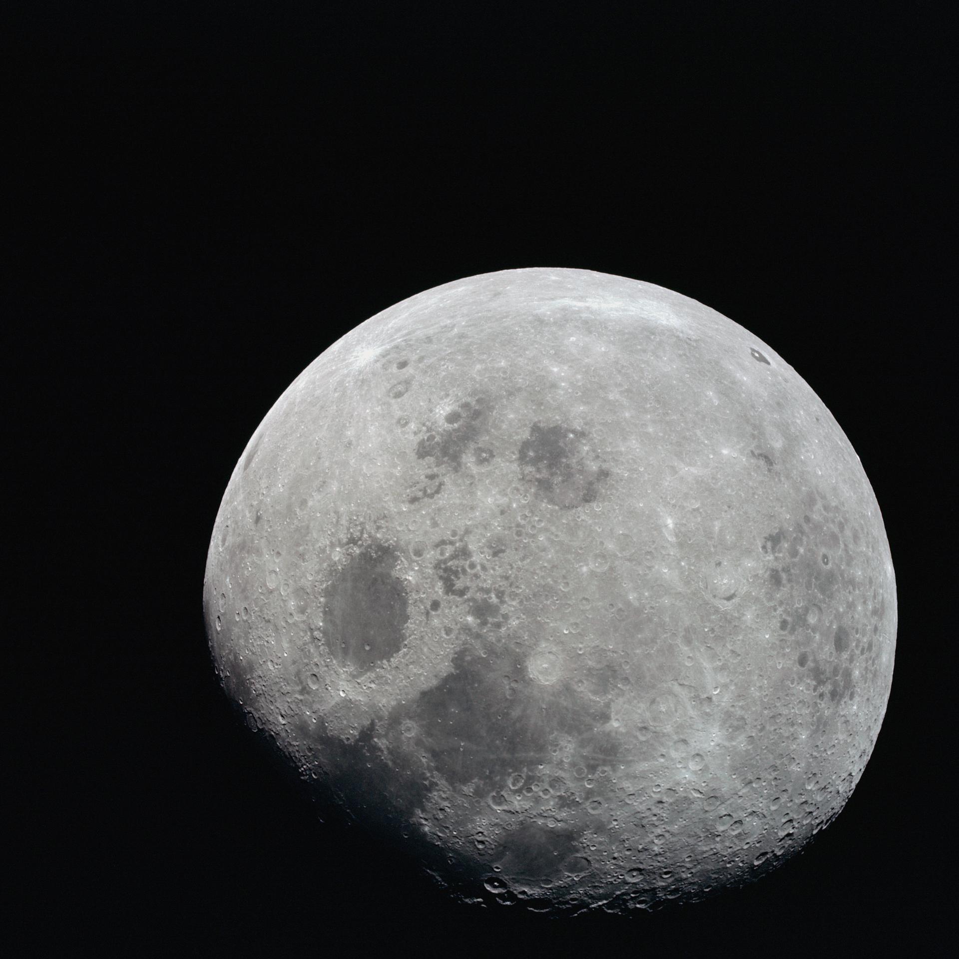 Mare Crisium, the circular, dark-colored area near the center, is near the eastern edge of the moon as viewed from Earth. 
