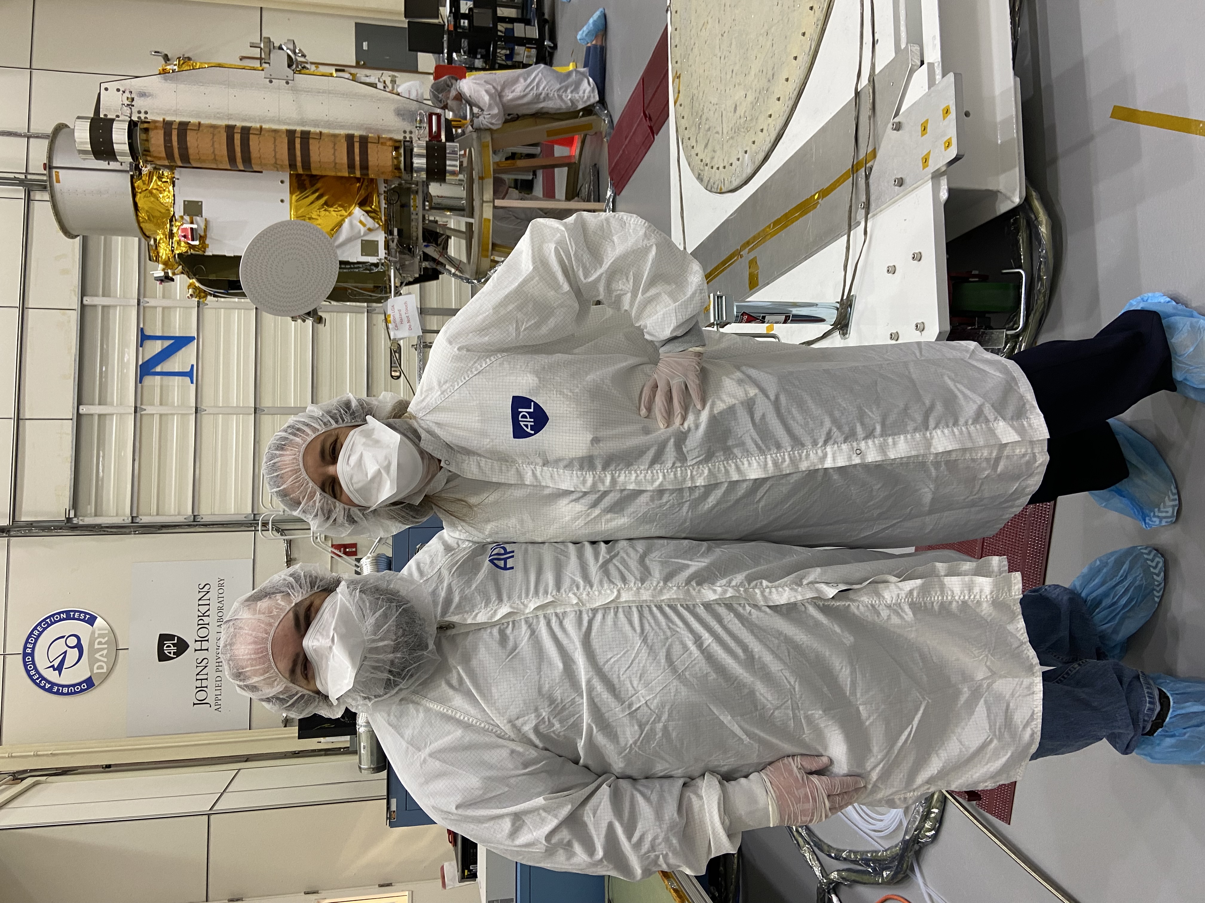 Nancy Chabot and Andy Rivkin, researchers at Johns Hopkins University Applied Physics Laboratory, are pictured with the DART spacecraft. 