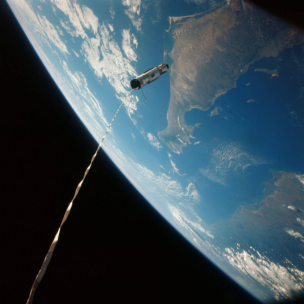 The Agena XII target vehicle, attached to Gemini XII by a 100-foot tether. 