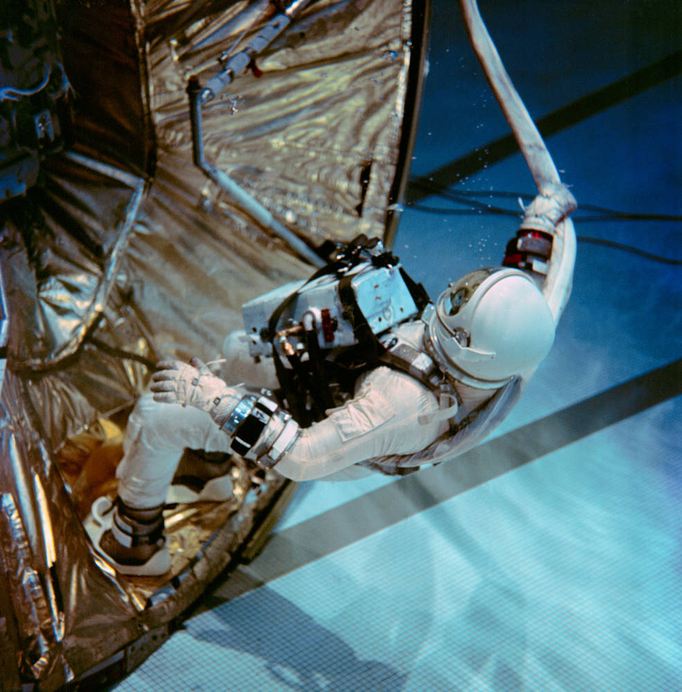 Using mockups of the Gemini and Agena spacecraft in the pool at the McDonogh School in Owings Mills, Maryland, astronaut Edwin E. “Buzz” Aldrin trains for his Gemini XII spacewalks in October 1966.