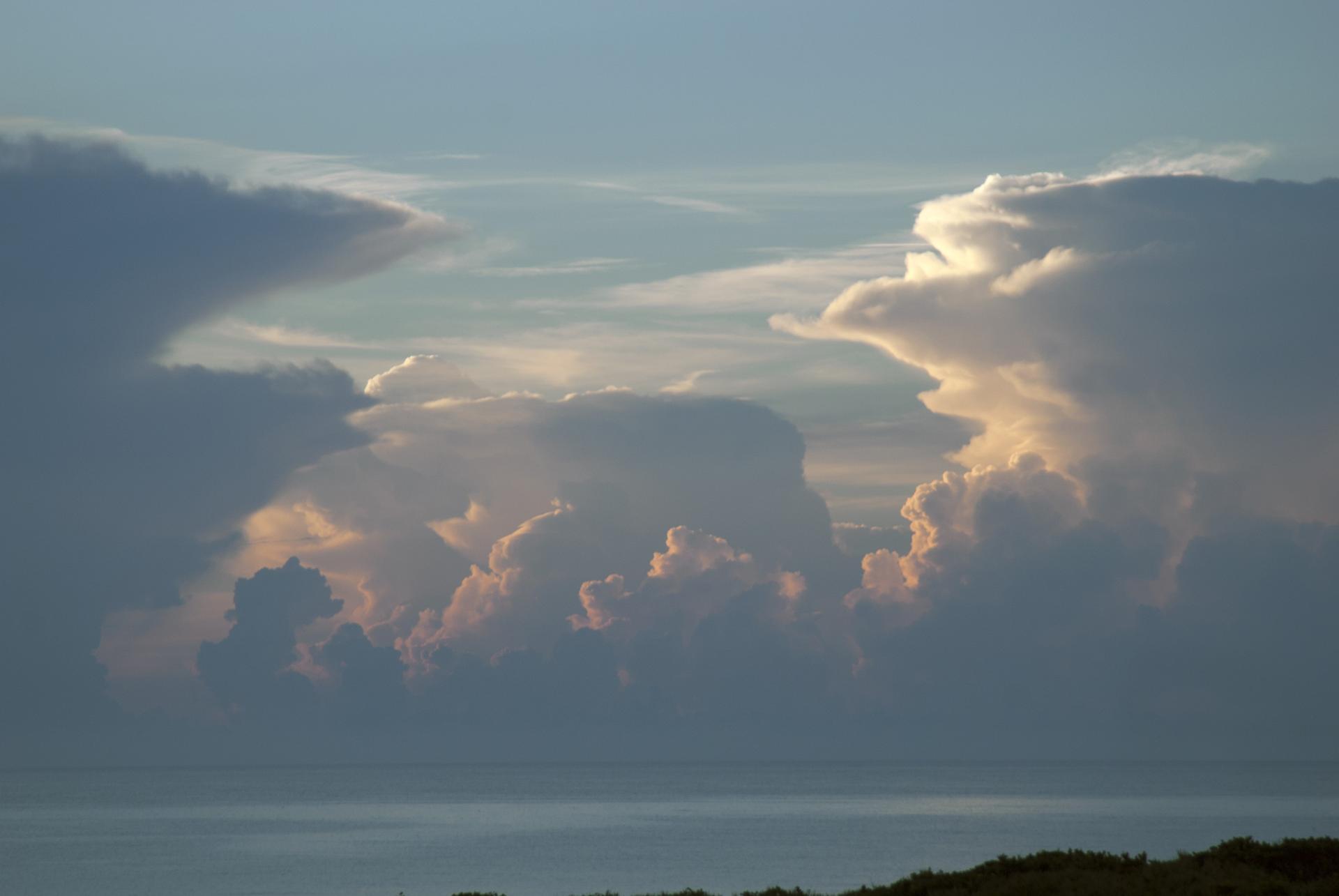 Towering cumulonimbus thunderstorm clouds are seen in this photo taken Aug. 15, 2014, looking east toward the Atlantic Ocean from the Space Launch Complex 37 area at Cape Canaveral Air Force Station (now Cape Canaveral Space Force Station) in Florida.