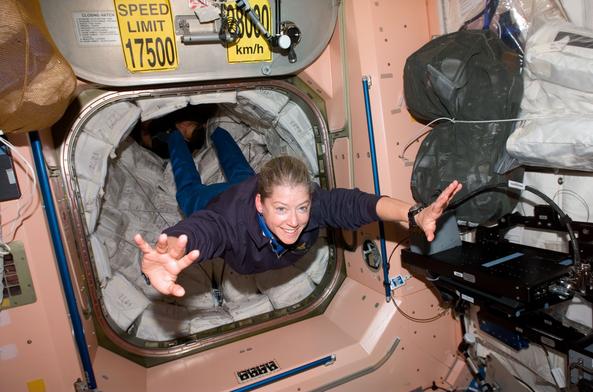 NASA Deputy Administrator Pam Melroy in 2007, when she was serving as an astronaut and mission commander, floating into the Unity node of the International Space Station.