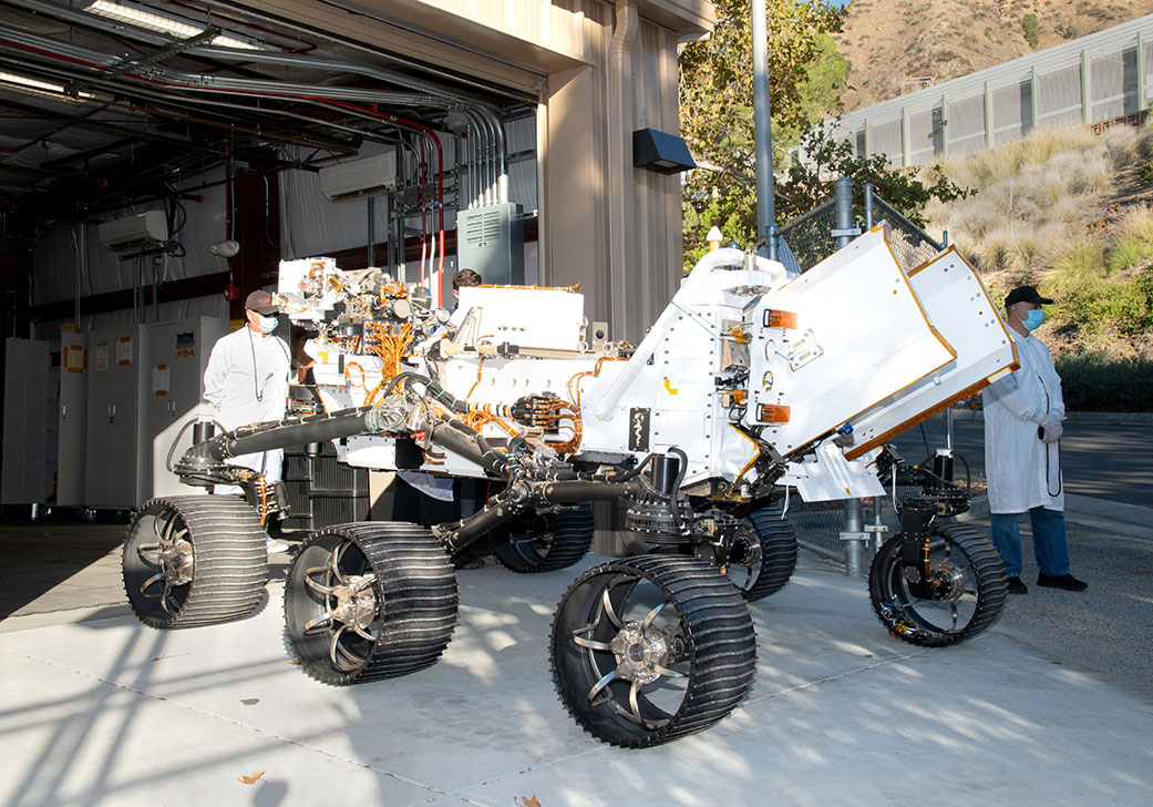 The twin of NASA’s Perseverance Mars rover arrives at JPL’s Mars Yard garage