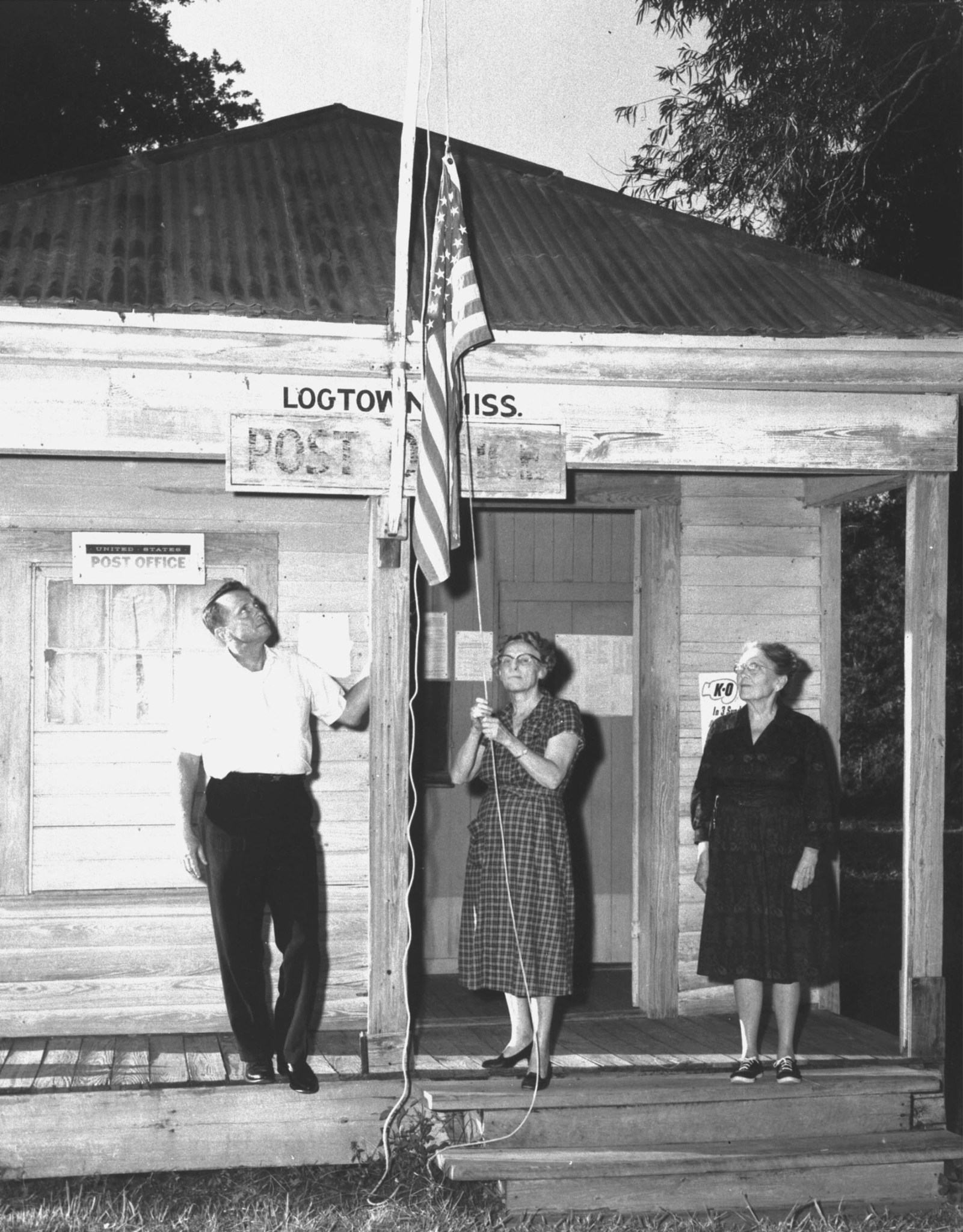 flag lowering at Logtown Post Office