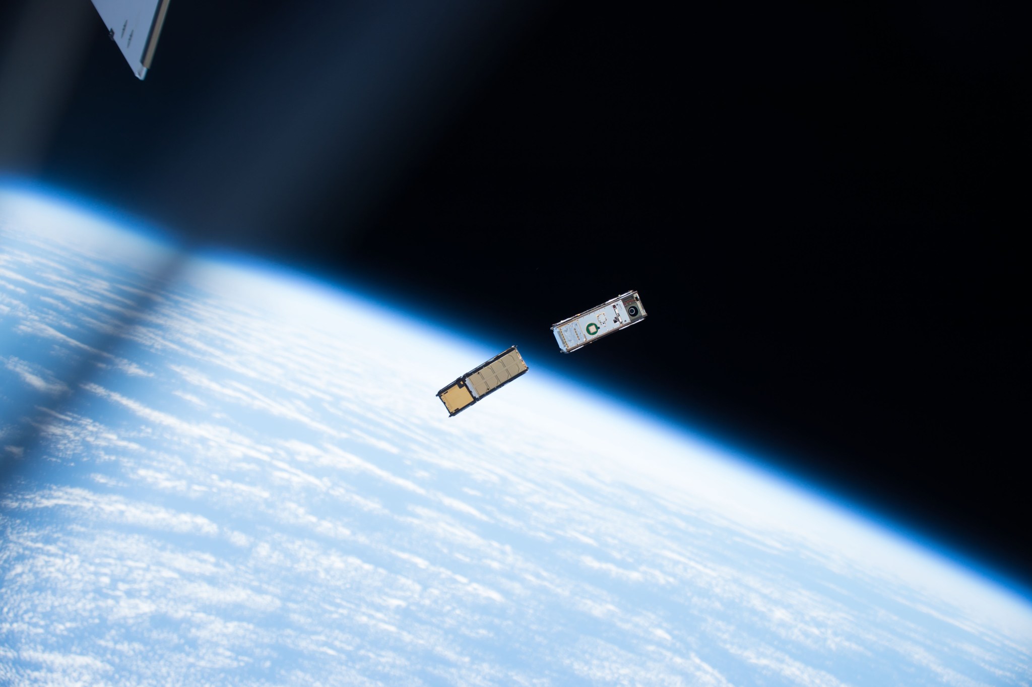 CubeSats as they were deployed from the International Space Station