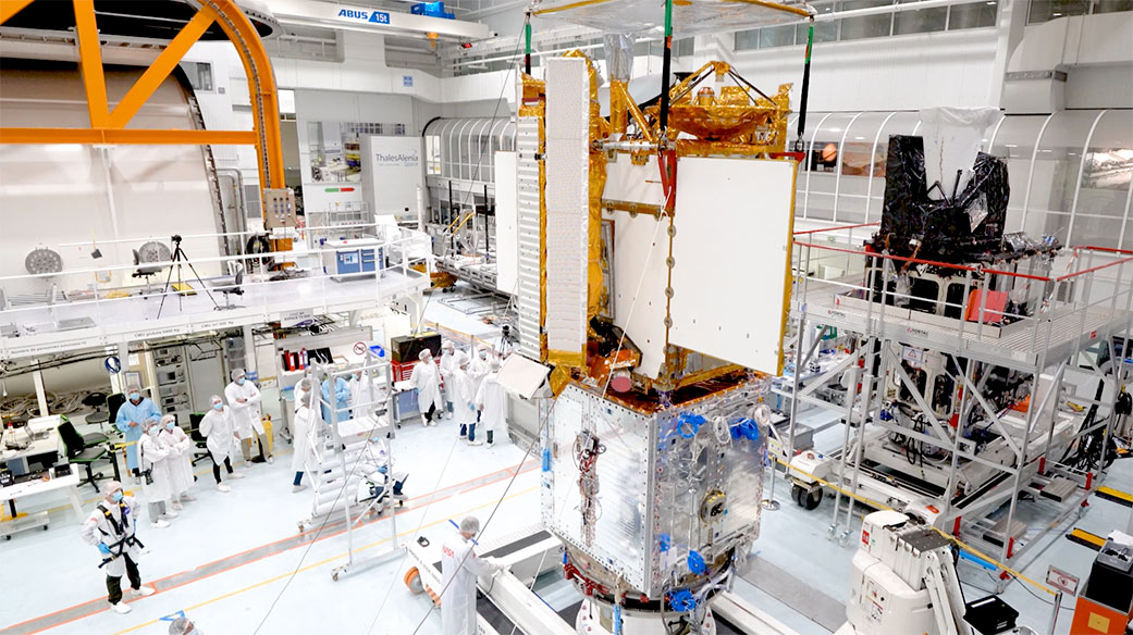 Engineers integrate separate parts of the SWOT satellite