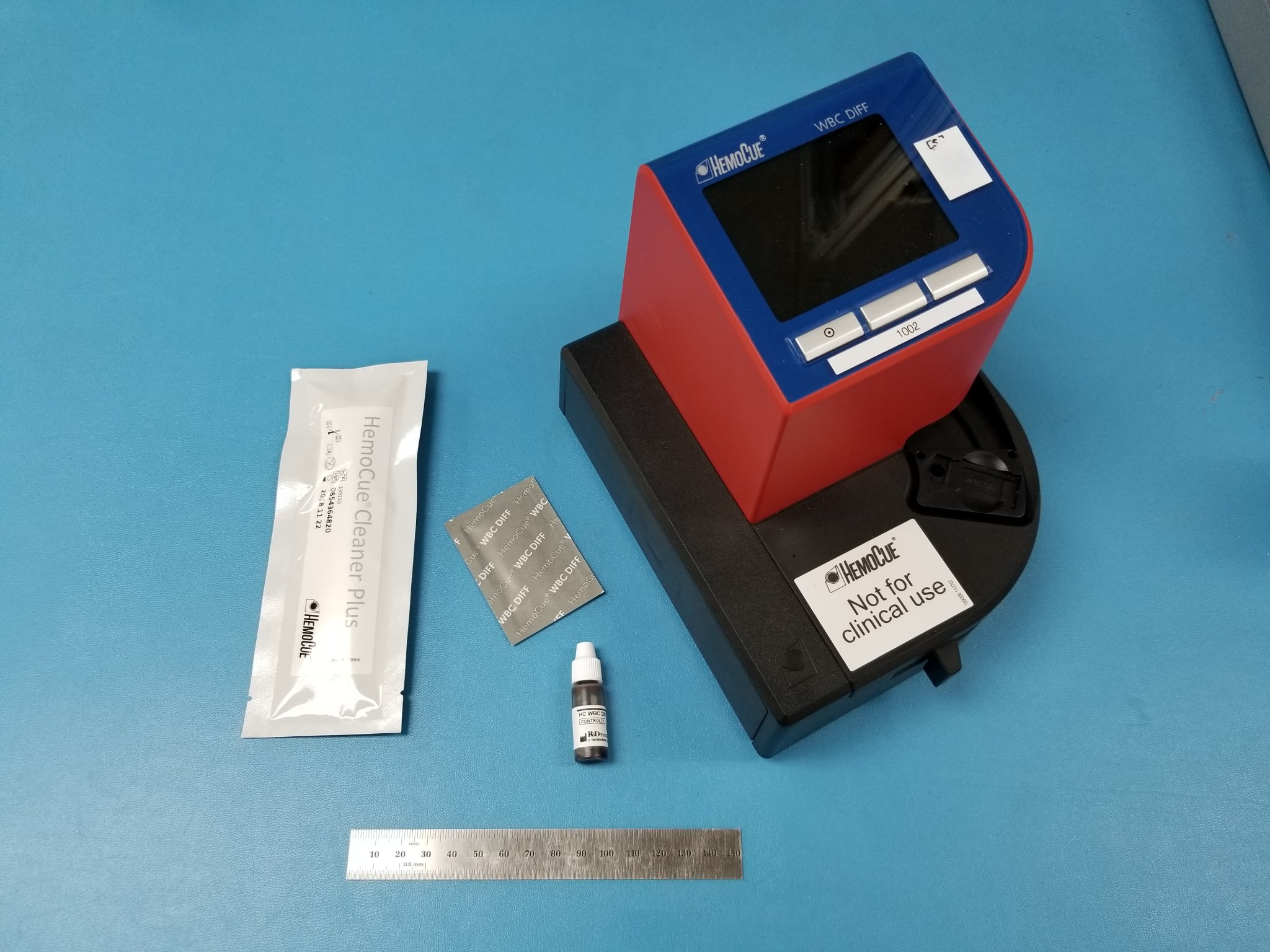 HemoCue white blood cell count analyzer and associated hardware.