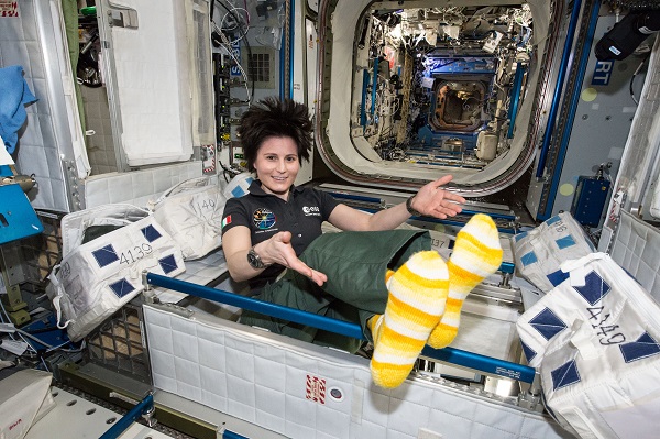 image of astronaut in crew quarters