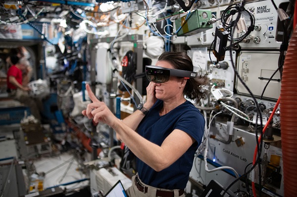 image of an astronaut using VR goggles