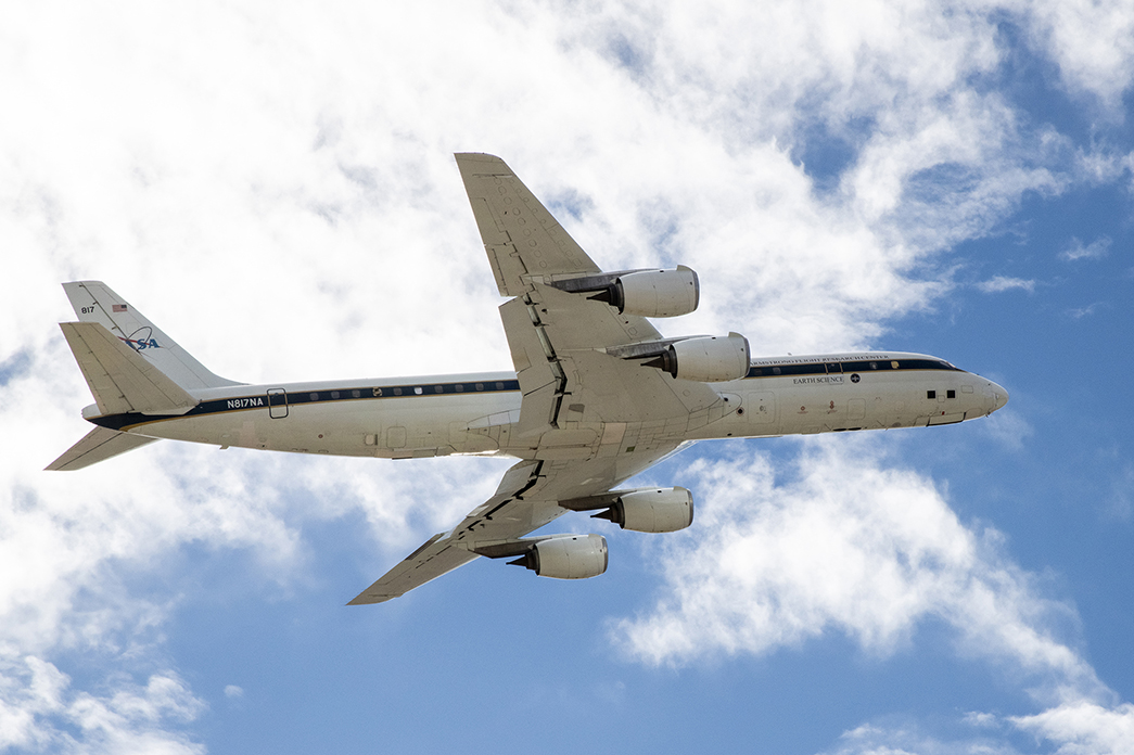 NASA’s Armstrong Flight Research Center DC-8 in flight, image is of the underbody of the aircraft.
