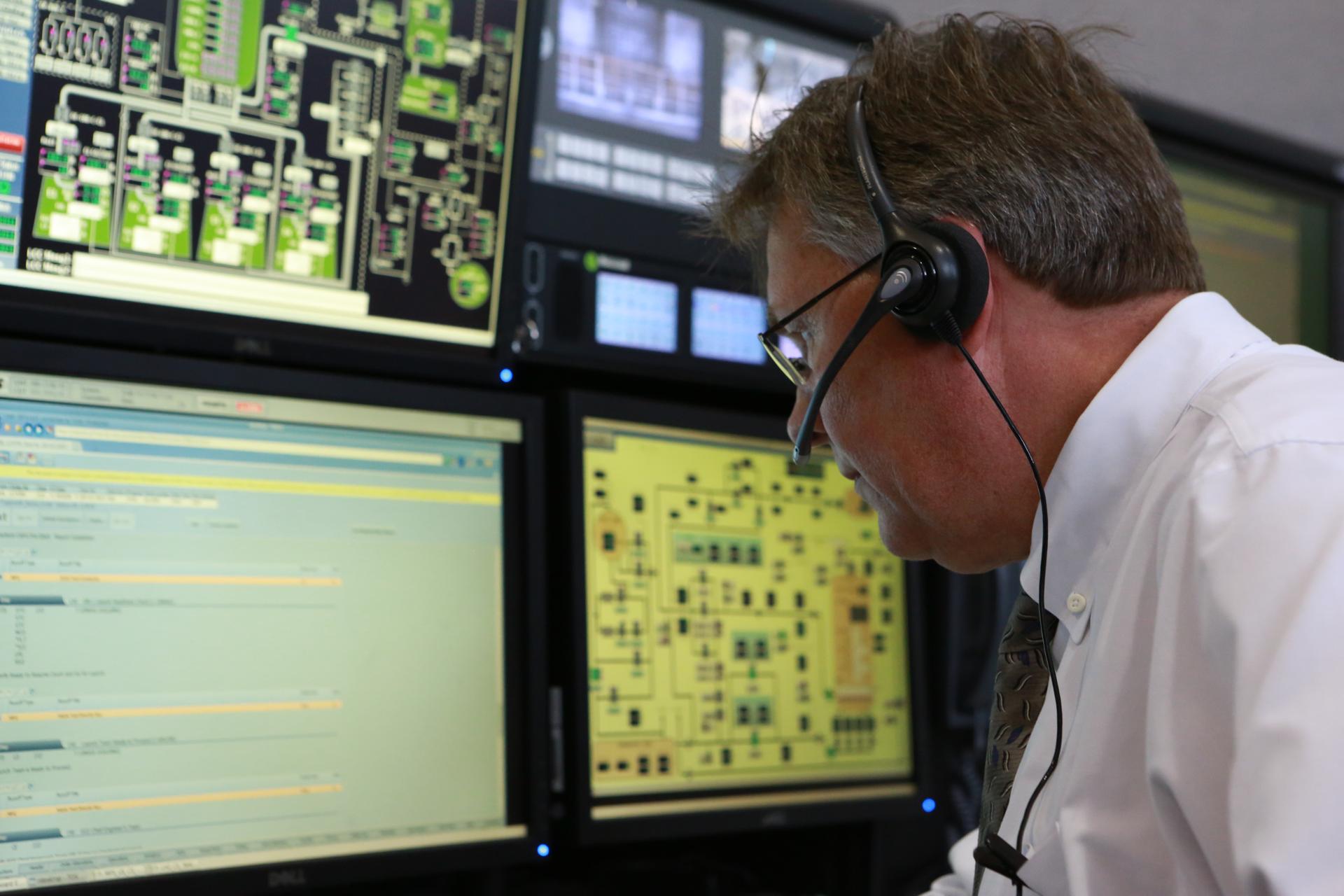 Senior NASA Test Director Jeff Spaulding monitors operations from his position in Firing Room 1 at Kennedy Space Center’s Launch Control Center during a countdown simulation.